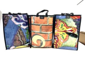 upcycled, recycled, banner, billboard, bag, tote, messenger, backpack, made in USA, upcycled banner bag, billboard, sewn in USA banner bag, recycled banner, tote, laptop, backpack, pouch