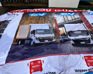 Isuzu old truck banners used for upcycled corporate swag